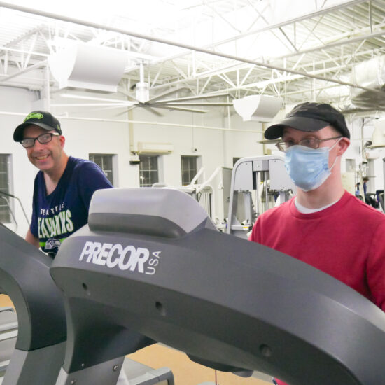 Patrick (left) and Chris (right) warming up on the treadmill.