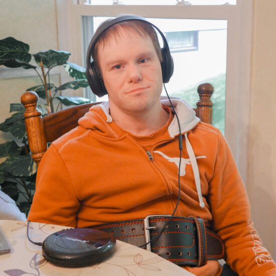 Gabriel Homes resident listening to music.