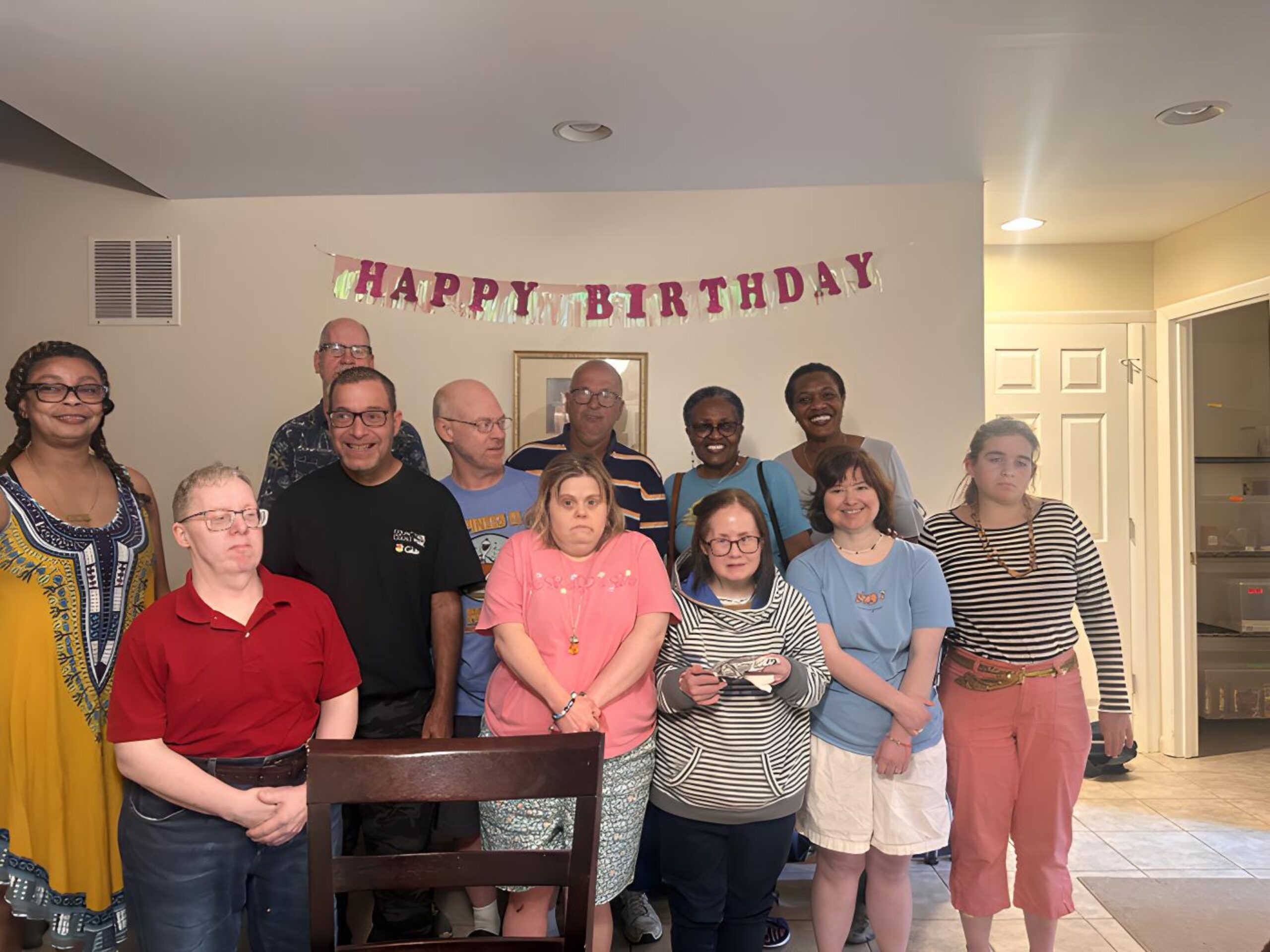 Gabriel Homes residents and staff celebrating at a surprise birthday party.