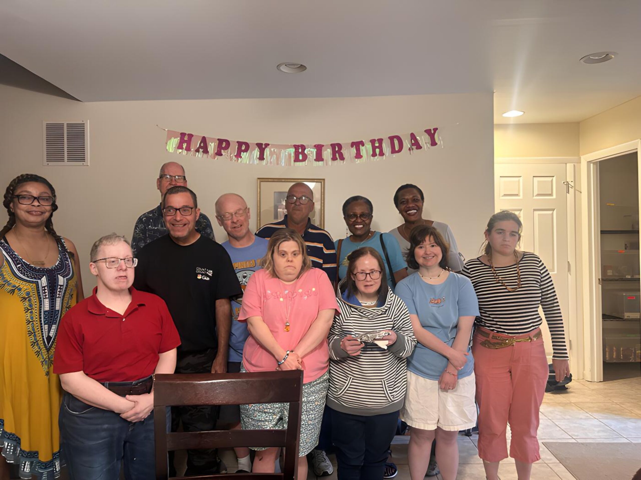 Gabriel Homes residents celebrating at a surprise birthday party. Two staff are finalists for the 2024 DSPY awards.