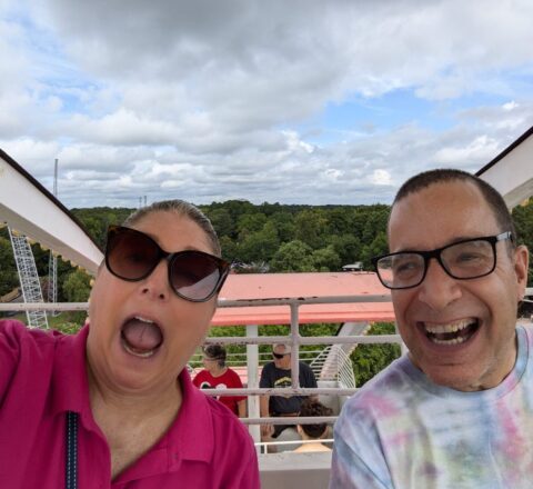 Gabriel Homes Executive Director Lynn Davis with a resident on the ferris wheel at Kings Dominion.