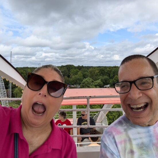 Gabriel Homes Executive Director Lynn Davis with a resident on the ferris wheel at Kings Dominion.