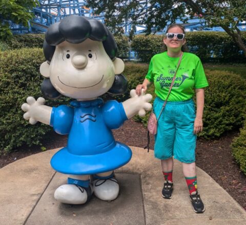 Gabriel Homes resident posing with Lucy at Kings Dominion.