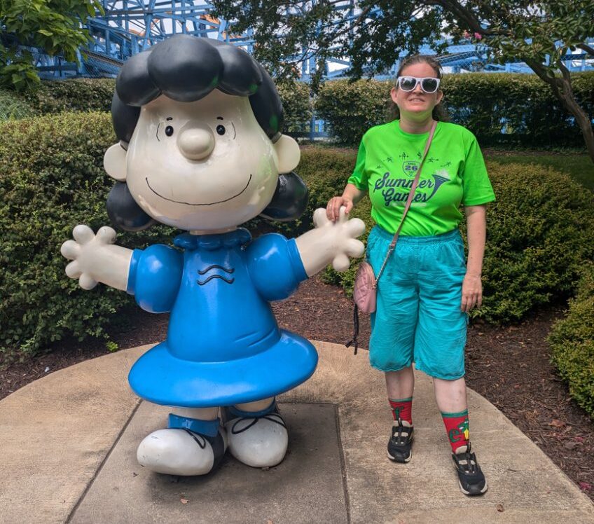 Gabriel Homes resident posing with Lucy at Kings Dominion.