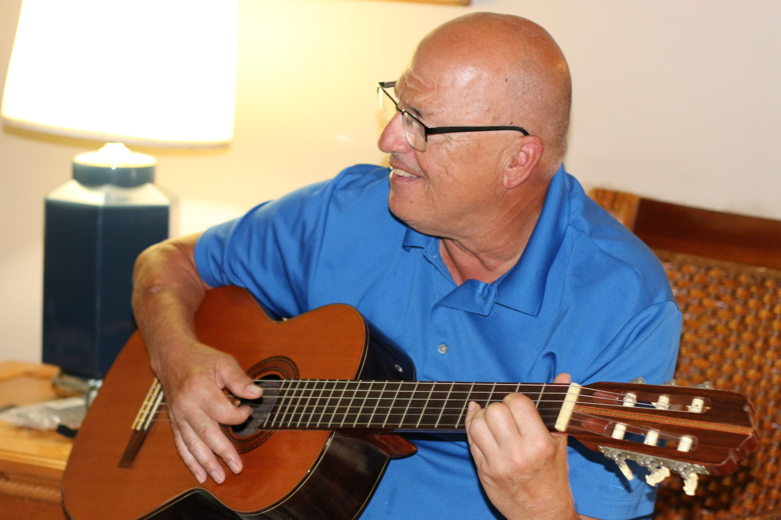 Gabriel Homes resident enjoying music and playing guitar.