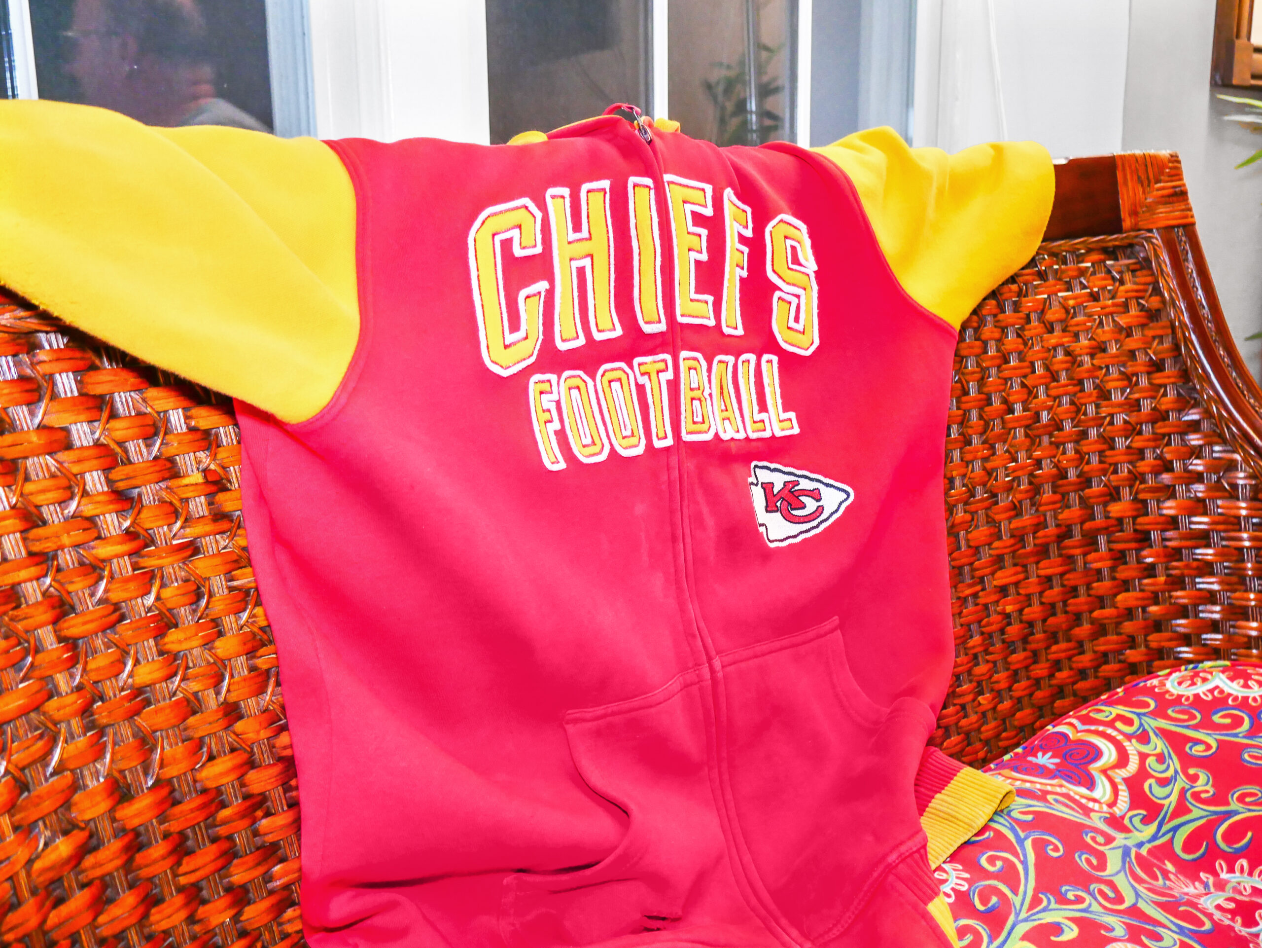 Kansas City Chiefs sweatshirt.