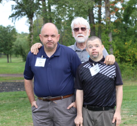 Gabriel Homes Board Member Gary Le Francois (center) with residents (left and right).