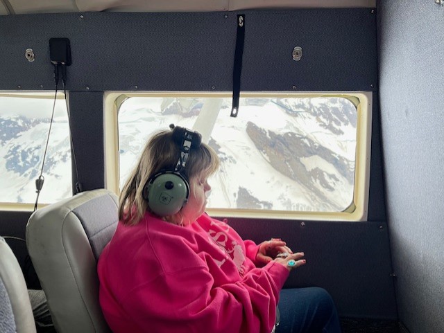 Gabriel Homes resident on helicopter in Alaska.