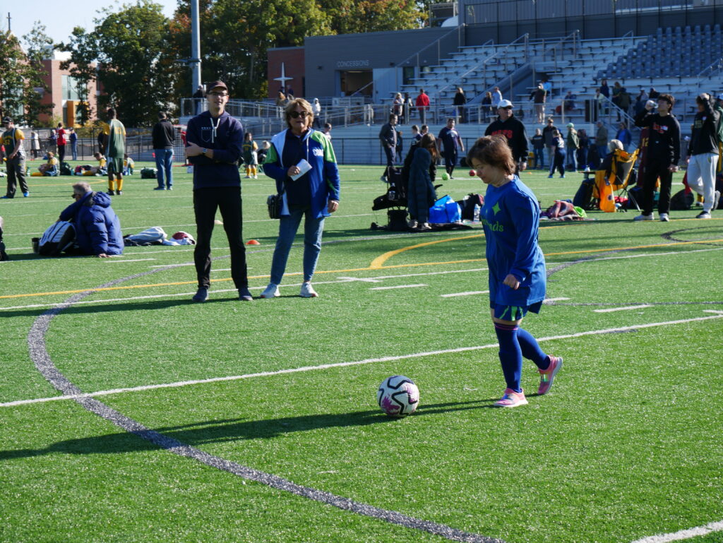 Gabriel Homes resident playing Special Olympics soccer.