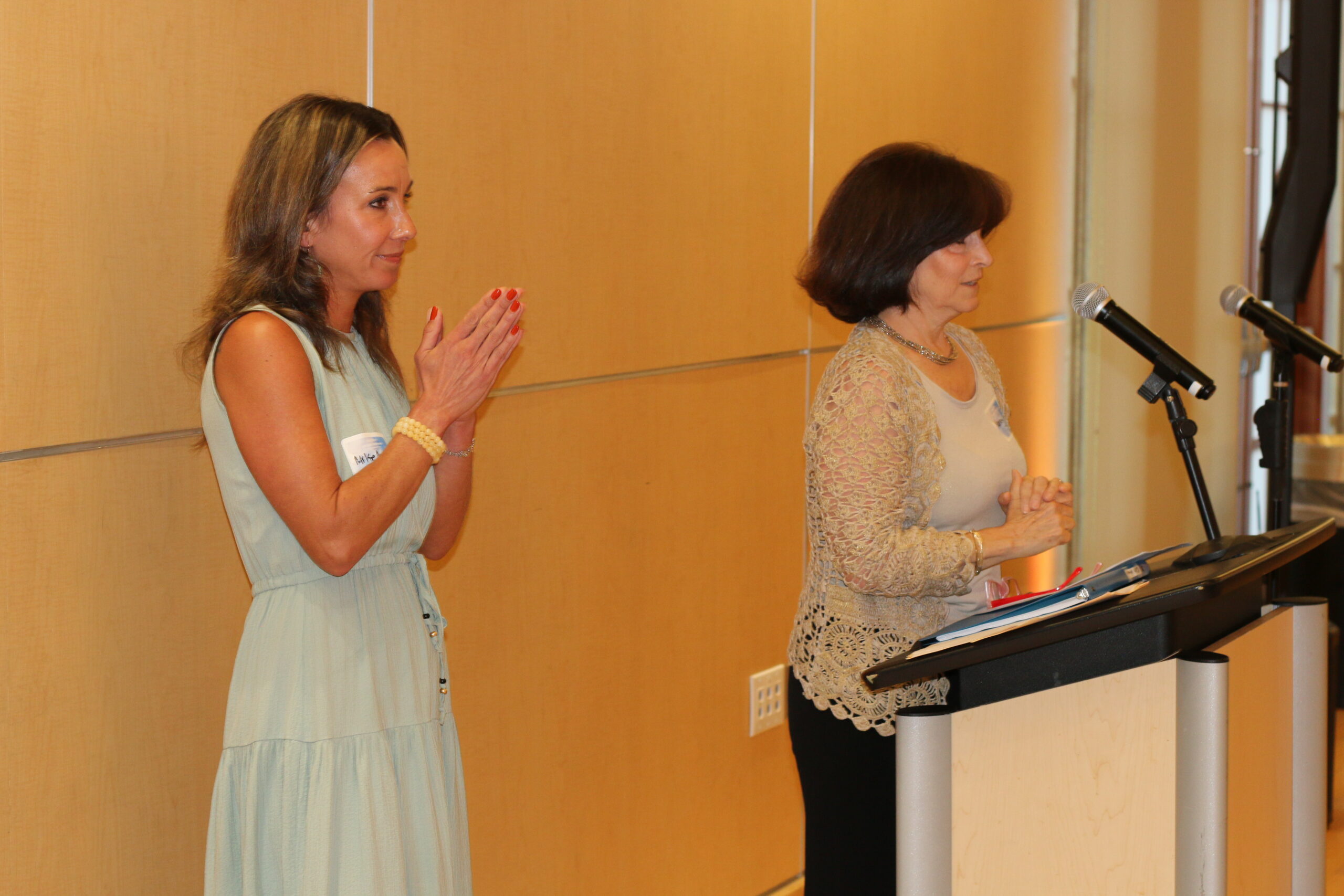 Mikelle Murray-Jarosz (left) and Nancy Mercer (right) speaking at the 2nd annual Direct Support Provider of the Year (DSPY) Awards.