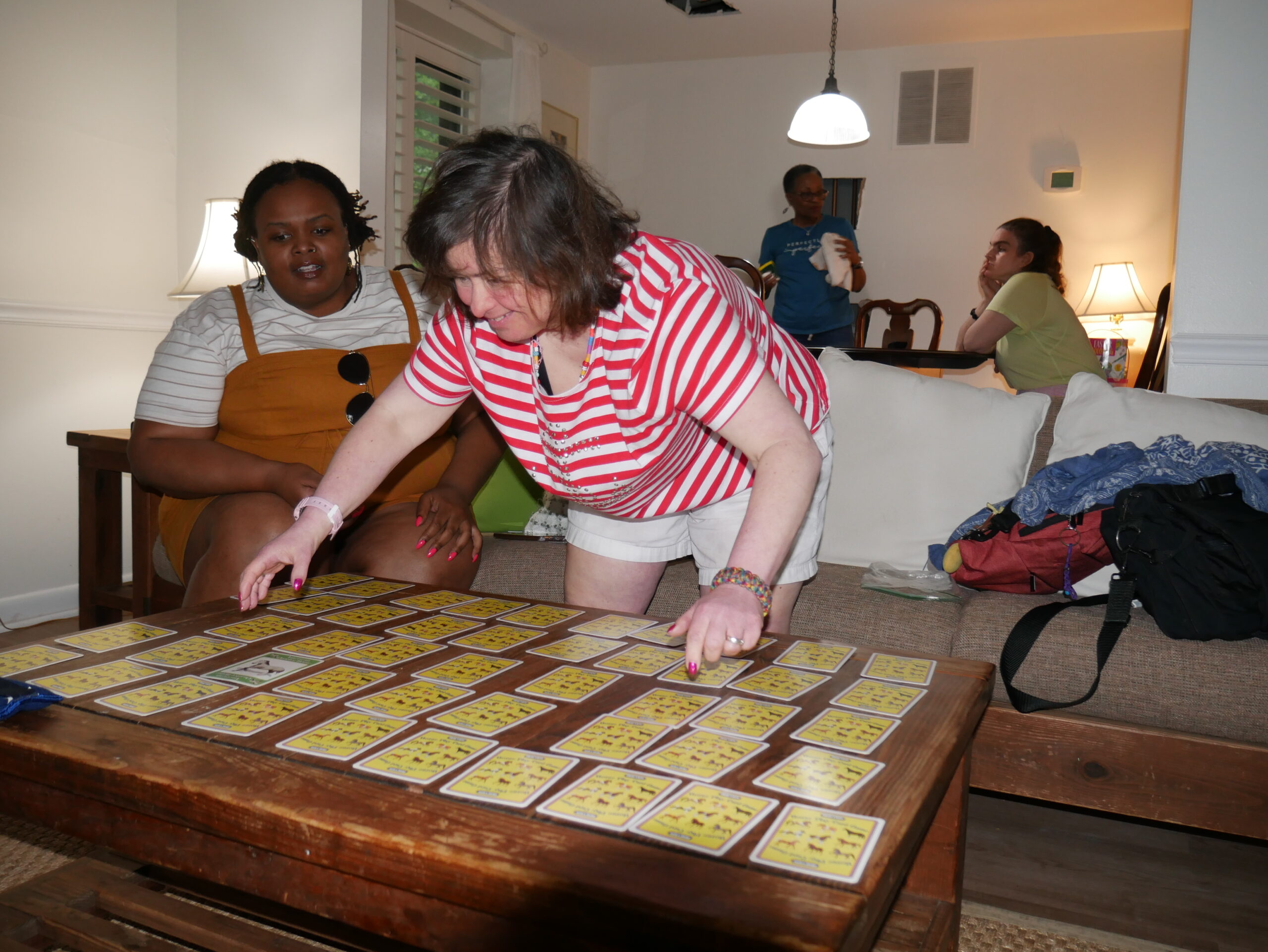 Gwen (left) and Gabriel Homes residents (right) at ladies' night.