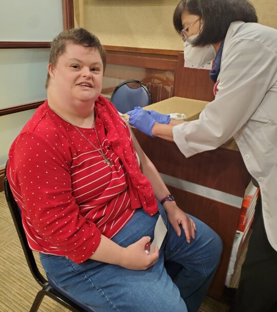 Gabriel Homes resident receiving vaccines against COVID-19 and the flu.