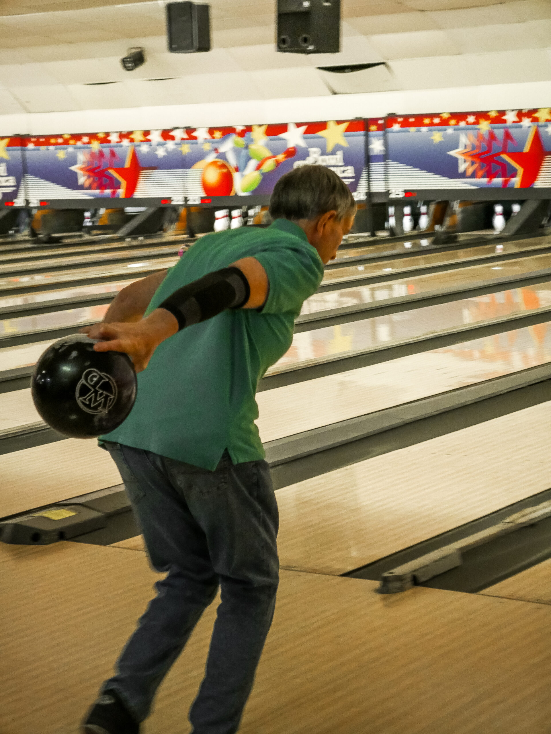 Friend of Gabriel Homes resident bowling. The sport tests players mentally and physically.