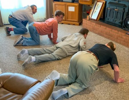 Gabriel Homes residents who have IDD participating in a Zoom yoga exercise session.