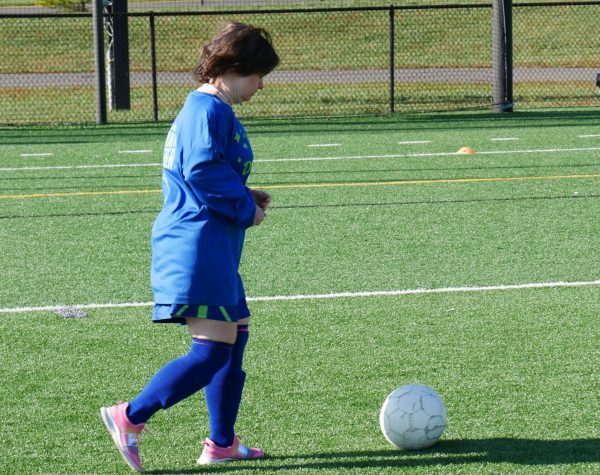 Gabriel Homes resident playing Special Olympics soccer.