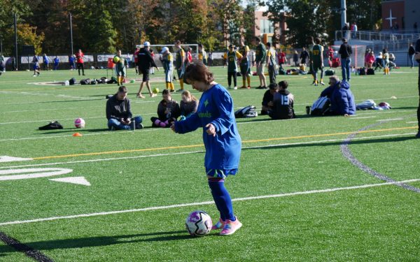 Gabriel Homes resident playing Special Olympics soccer.