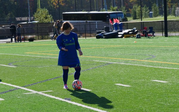 Gabriel Homes resident playing Special Olympics soccer.