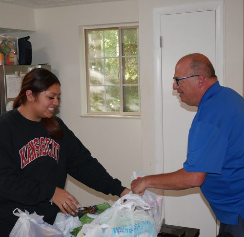 Angela Rivera (right), with resident at Gabriel Homes (left).