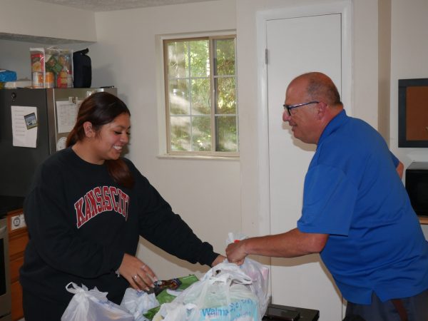 Angela Rivera (right), with resident at Gabriel Homes (left).