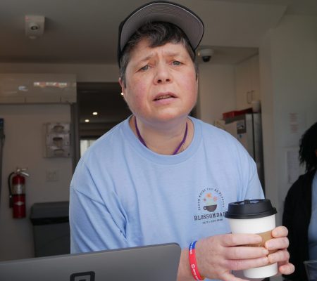 Gabriel Homes resident serving coffee at her new job in the new year.