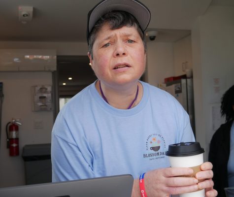 Gabriel Homes resident serving coffee at her new job in the new year.