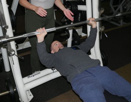 Gabriel Homes resident and Special Olympics powerlifting champion at practice.