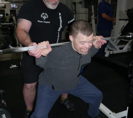 Gabriel Homes resident and Special Olympics powerlifting champion at practice.