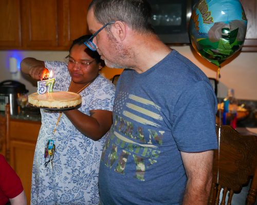 Gabriel Homes staff (left) and resident (right) celebrating a birthday.