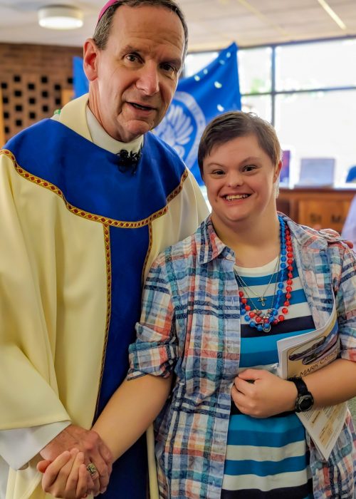 Sarah, a resident at Gabriel Homes, meeting the Archbishop.