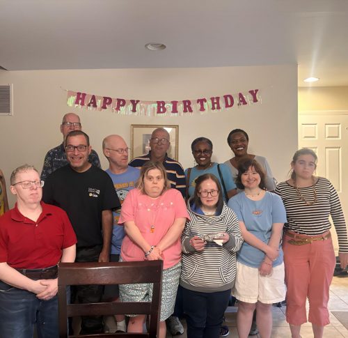 Gabriel Homes residents and staff celebrating at a surprise birthday party.