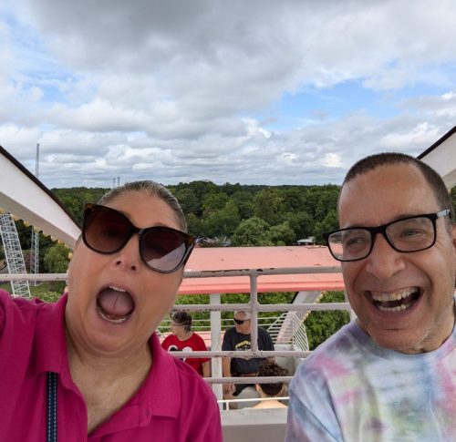 Gabriel Homes Executive Director Lynn Davis with a resident on the ferris wheel at Kings Dominion.