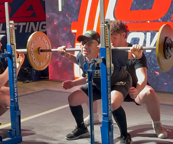 Gabriel Homes resident powerlifting at tournament.